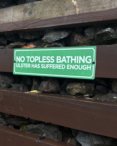 No Topless Bathing Sign