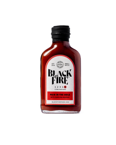 Dolor en el hoyo Salsa picante