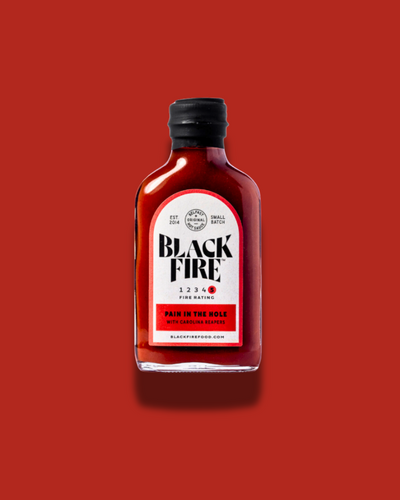 Dolor en el hoyo Salsa picante