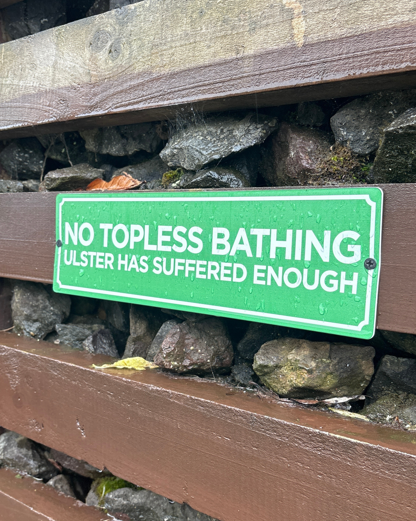 No Topless Bathing Sign