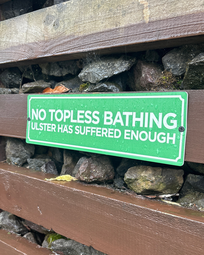 No Topless Bathing Sign