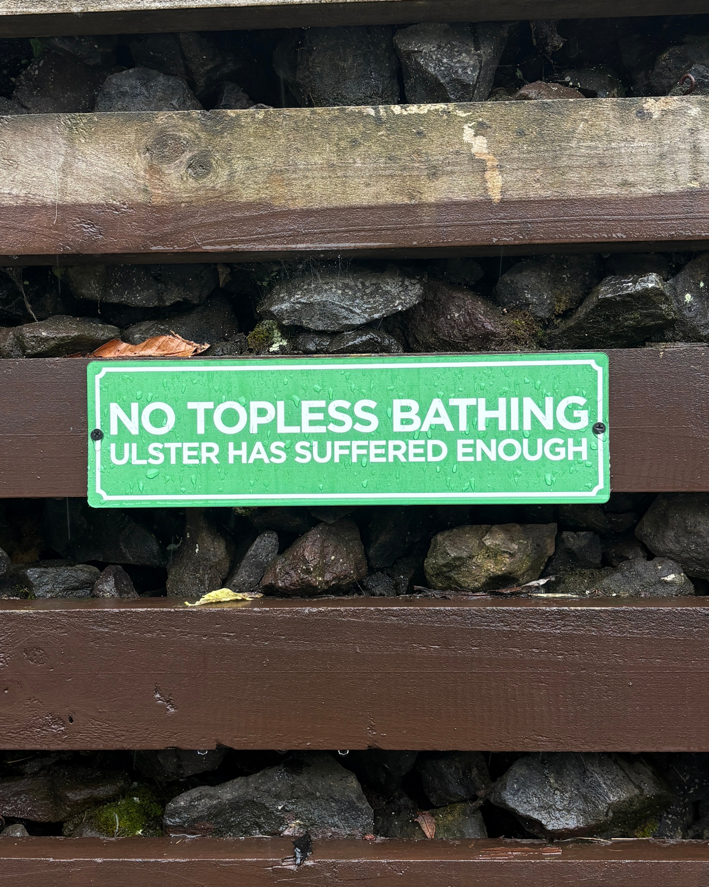 No Topless Bathing Sign