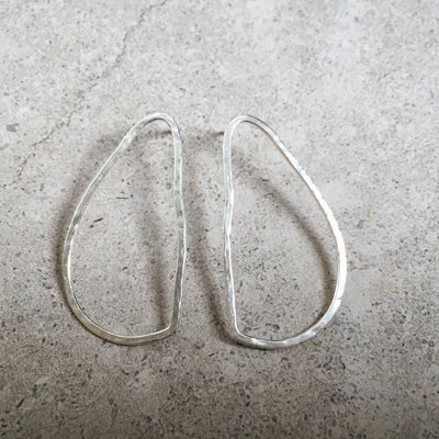oval drop earring silver lines and current