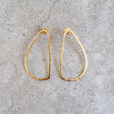 oval drop earring gold lines and current