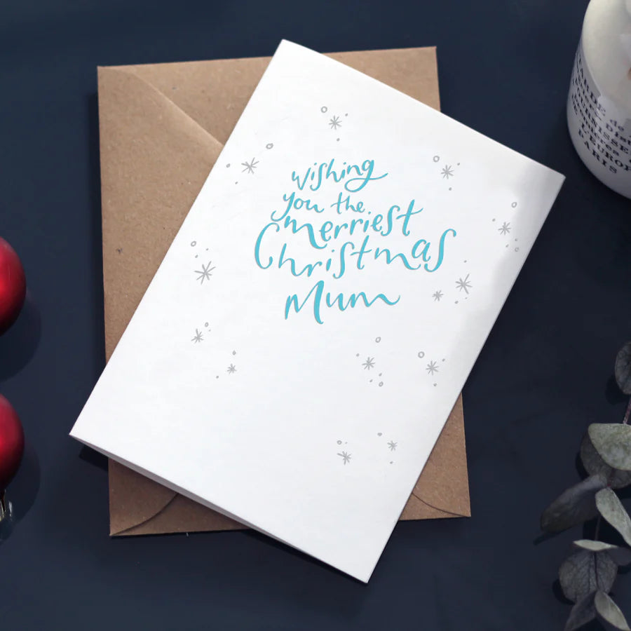 Wir wünschen Ihnen eine frohe Weihnachts-Mama-Buchdruckkarte